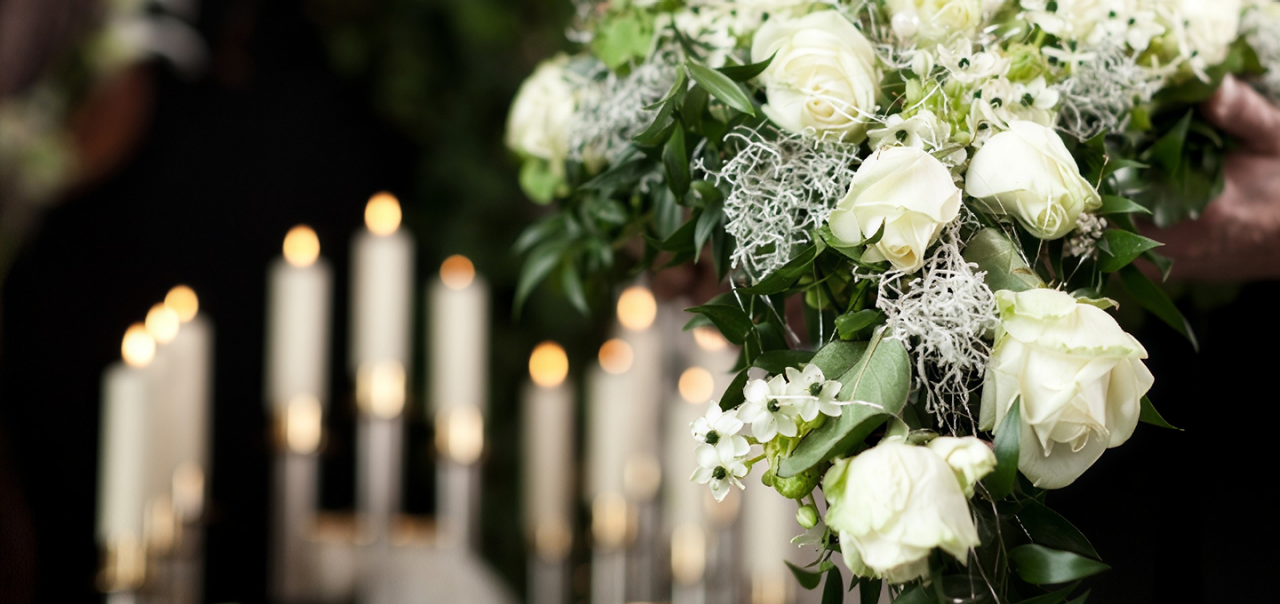 Gatton funeral director greeting a woman