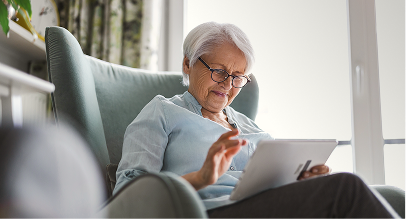 woman looking at iPad