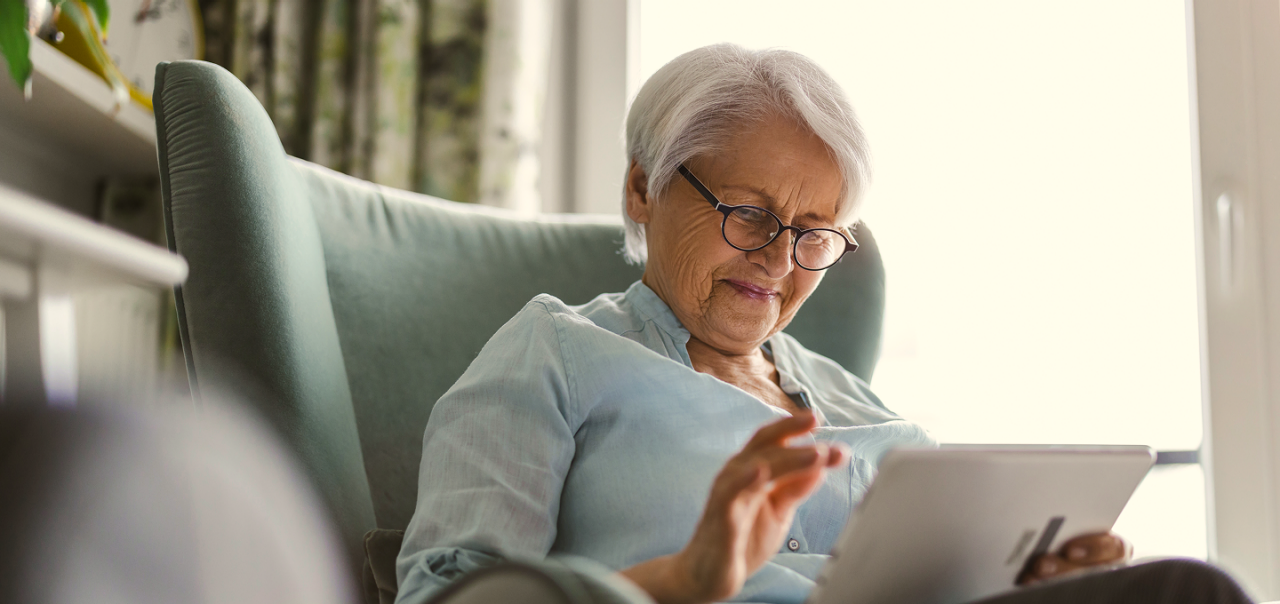 woman looking at iPad