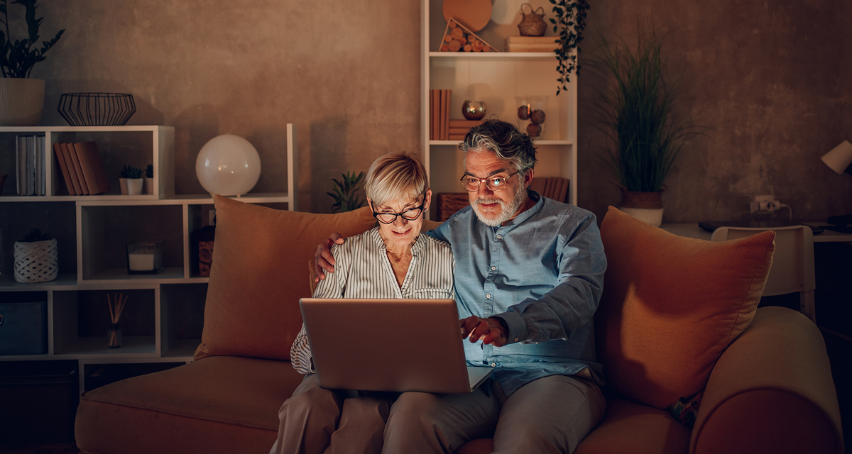 two people looking at laptop