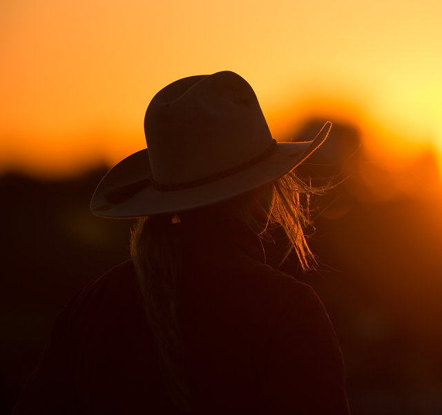 women looking into sunset
