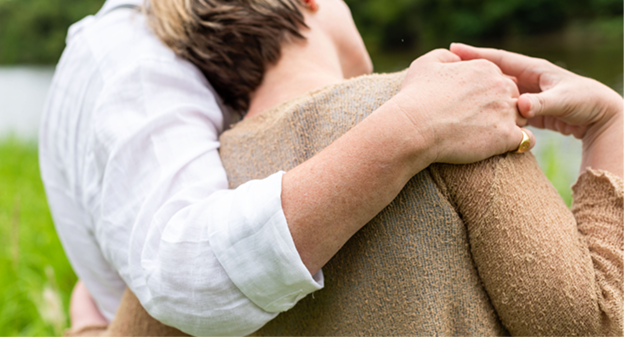 Gatton funeral director greeting a woman