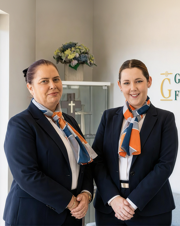 Gatton funeral director greeting a woman